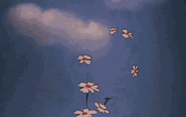 a bunch of flowers are flying in the air in a cartoon .