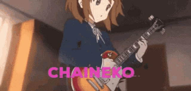 a girl is playing a guitar in a room with the words chaineko written in pink .