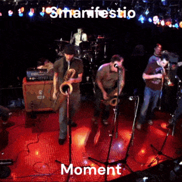 a group of men are playing instruments on a stage with the words moment written on the bottom