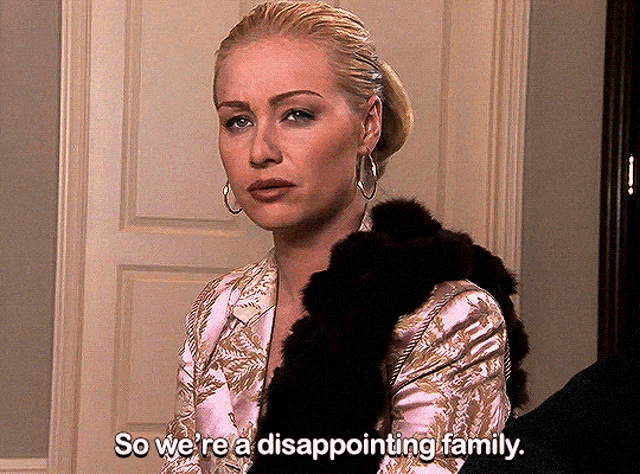 a woman wearing a fur coat says so we 're a disappointing family