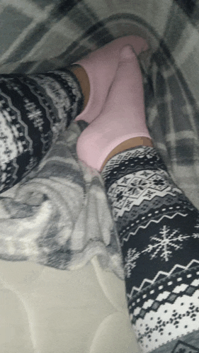 a person wearing a pair of pink socks