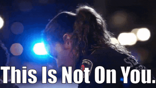 a woman in a police uniform with the words " this is not on you " above her