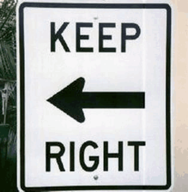 a sign that says keep right with an arrow pointing to the left