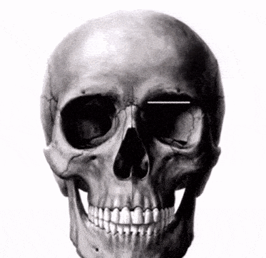 a black and white drawing of a skull with a smile on it