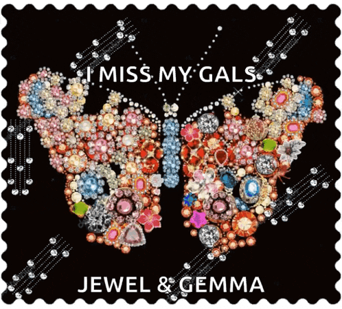 a jewel and gemma stamp with a butterfly made out of gems