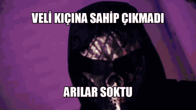 a person wearing a mask with the words veli kicina sahip çikmadi