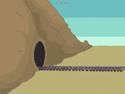 a train is coming out of a tunnel in the desert