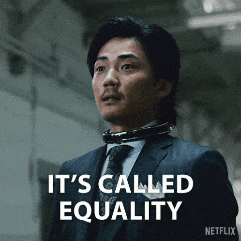 a man in a suit and tie says it 's called equality in white letters