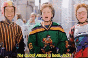 a group of young boys are standing next to each other and one of them is wearing a jersey with the number 6 on it