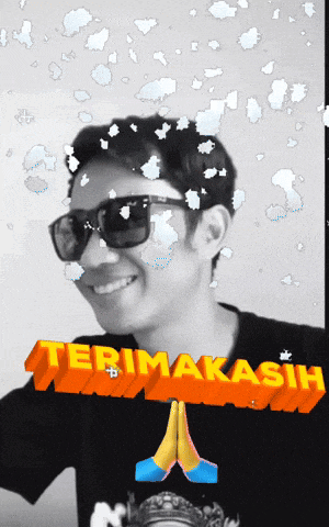 a man wearing sunglasses and a t-shirt that says terimakasih