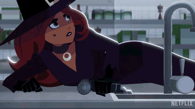 a witch is laying on a counter next to a faucet with netflix written on the bottom right