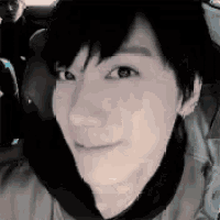 a close up of a person taking a selfie in a car .