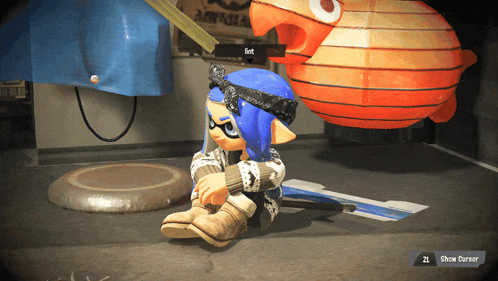 a video game character is sitting in front of a large orange lantern and has the word first written on the screen