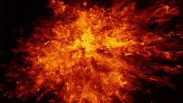 a large explosion of fire with a black background is shown