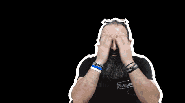 a man with a beard is wearing a black shirt that says ' franklin ' on it