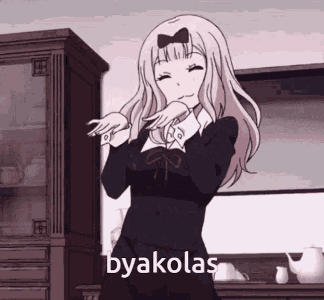 a picture of a girl dancing with the word byakolas in the corner
