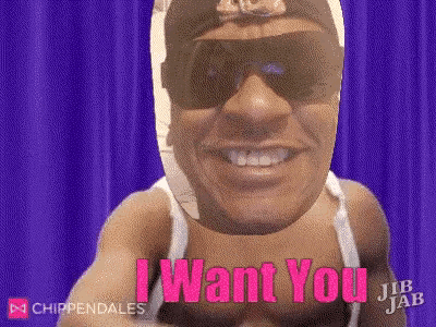 a man wearing sunglasses and a mask is smiling and says i want you .
