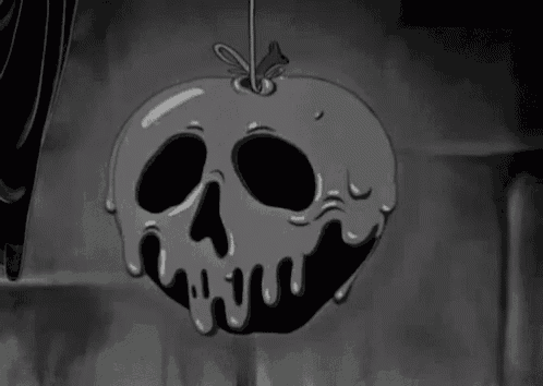 a black and white drawing of a skull shaped apple .