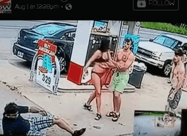 a woman in a bathing suit is standing in front of a gas station