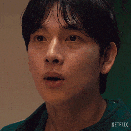 a close up of a man 's face with the word netflix on the bottom right
