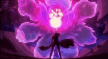 a man is standing in front of a large purple flower .