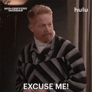a man in a striped sweater says " excuse me "