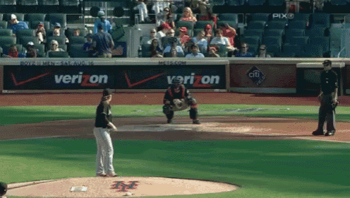 a baseball game is being played in a stadium with ads for verizon and citi