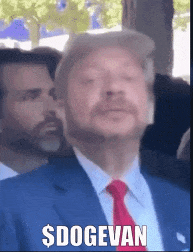 a man in a blue suit and red tie says dogevan