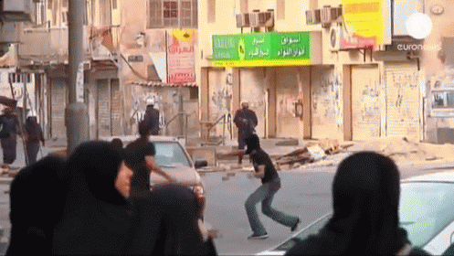 Bahrain: Protesters Clash With Police On The Eve Of Grand Prix. GIF - News Politics Bahrain GIFs
