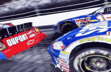 a race car that has the number 15 on the side