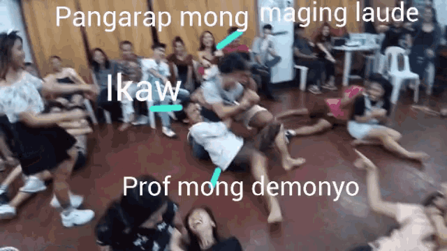 a group of people are laying on the floor with prof mong demonyo written in the corner