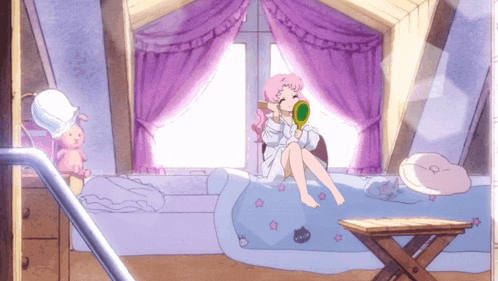 a girl with pink hair is sitting on a bed looking at herself in the mirror