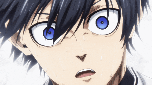 a close up of a person 's face with large blue eyes