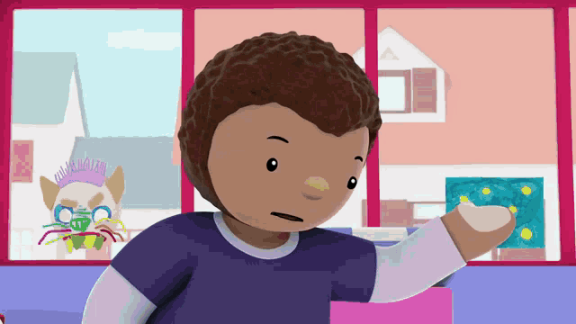 a boy in a blue shirt is standing in front of a window with a cat in the background