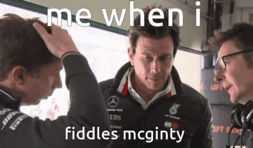 a group of men standing next to each other with the caption " me when i fiddles mcginty " on the bottom