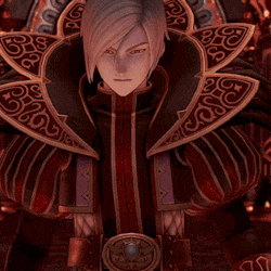 a man in a red and black costume with the letter s on his chest