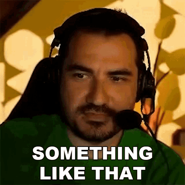 a man wearing headphones and a microphone has something like that written on his face