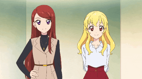 two anime girls are standing next to each other and smiling