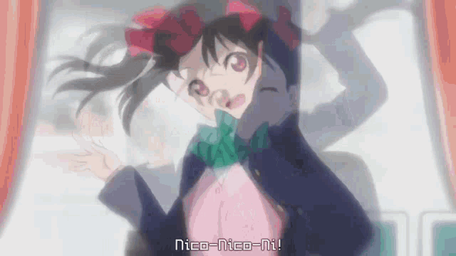 a girl with a bow in her hair says nico nico-ni