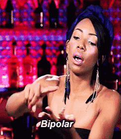 a woman is making a funny face and the word bipolar is on the bottom left