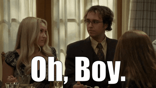 a man and a woman are sitting at a table with the words oh boy written above them