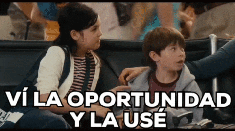 a girl and a boy are sitting next to each other with the words vi la oportunidad y la use