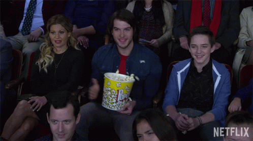 Entertained Happy GIF - Entertained Happy Spilling Popcorn GIFs