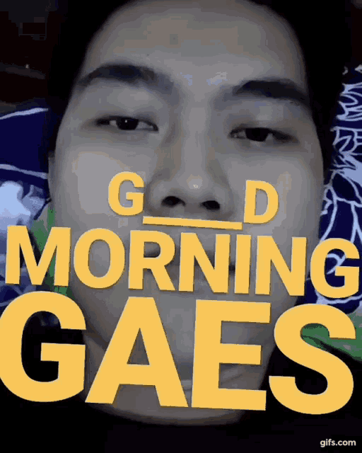 a close up of a man 's face with the words " good morning gaes " above it