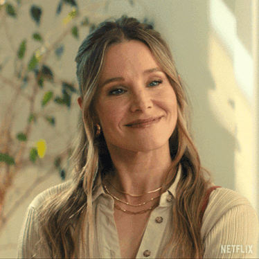 a close up of a woman 's face with the word netflix on the bottom