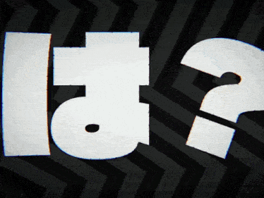 a black and white striped background with the word ita written in white