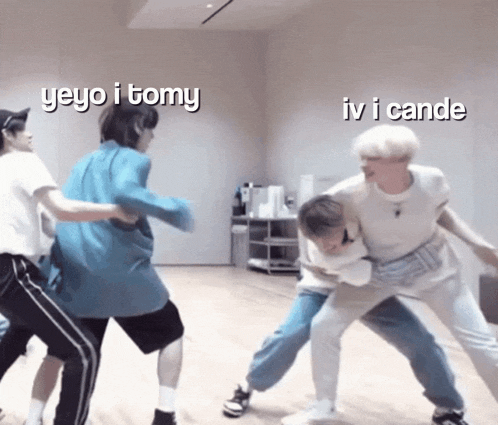 a group of young men are dancing in a room with the words yeyo i tomy iv i cande written on the bottom