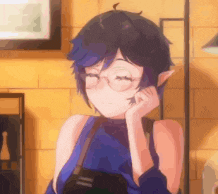 a girl wearing glasses and a blue shirt is holding a camera .