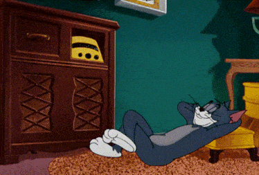 a cartoon of a cat laying on the floor in front of a radio