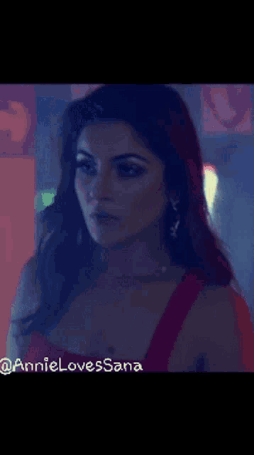 a close up of a woman 's face with the words annie loves sana on the bottom right